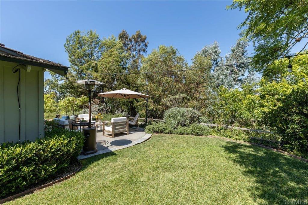 5125 El Secreto Rancho Santa Fe, CA 92067 - Photo 20 of 35 a view of a backyard with plants and a garden