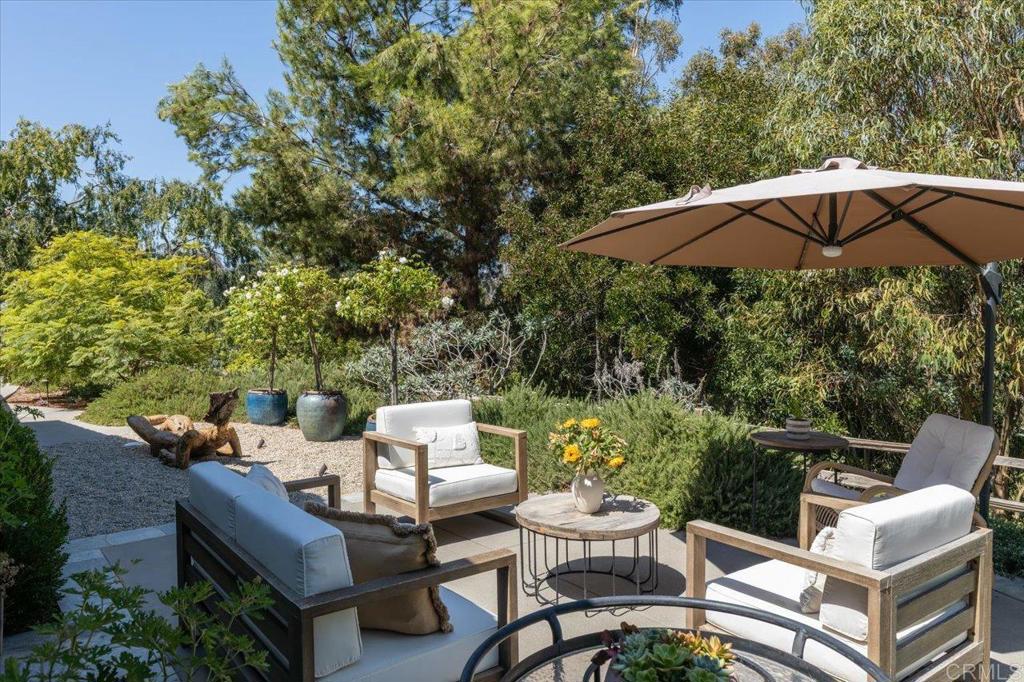 5125 El Secreto Rancho Santa Fe, CA 92067 - Photo 22 of 35 a view of a patio with furniture and backyard