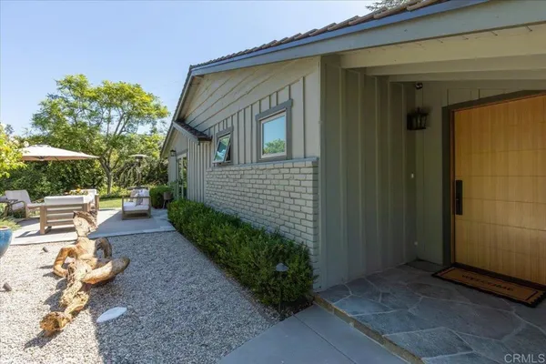 a view of a back yard of the house