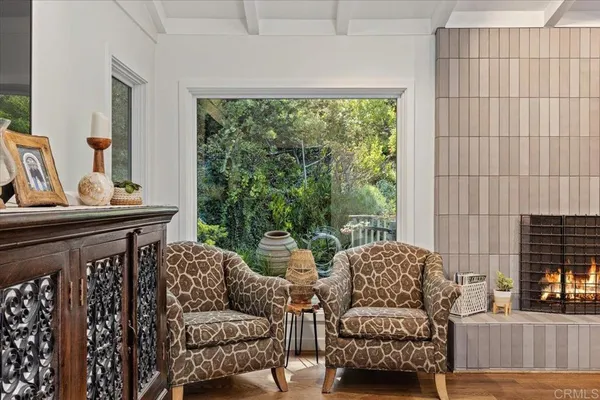 a living room with furniture and a window