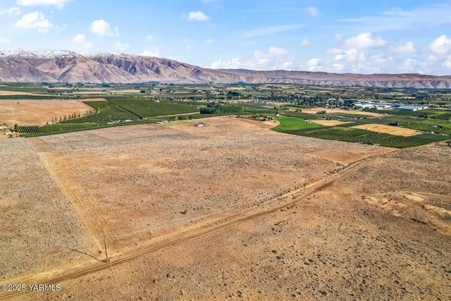 a view of a lake with a mountain in the background