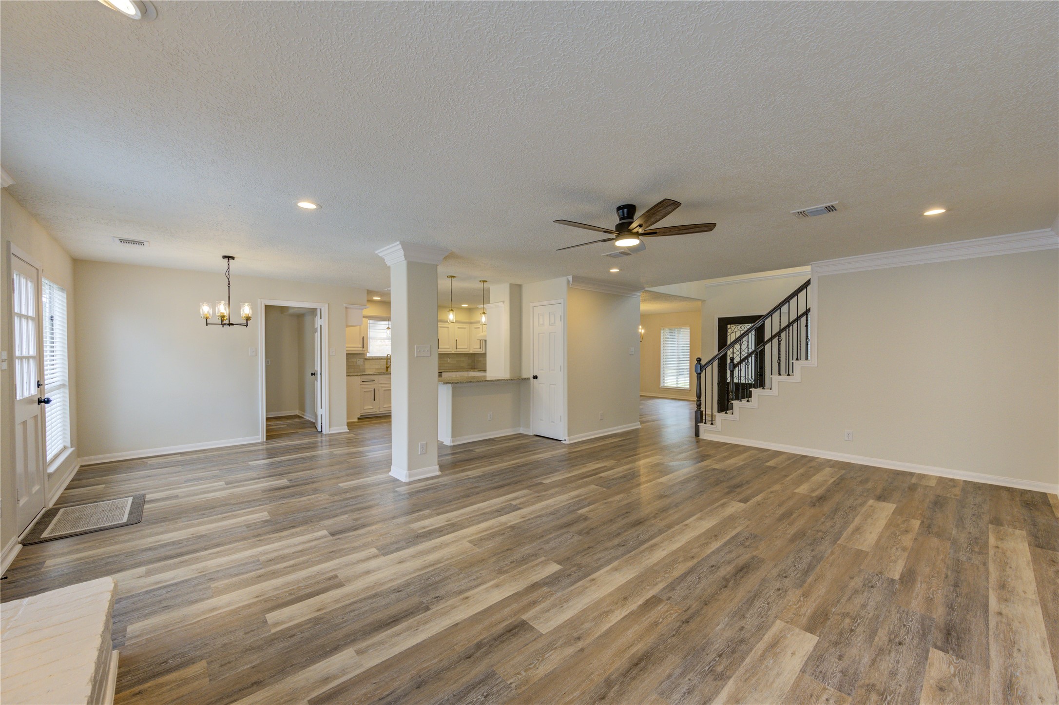 12015 Laneview Drive Houston, TX 77070 - Photo 10 of 40 a view of an empty room with wooden floor and a window