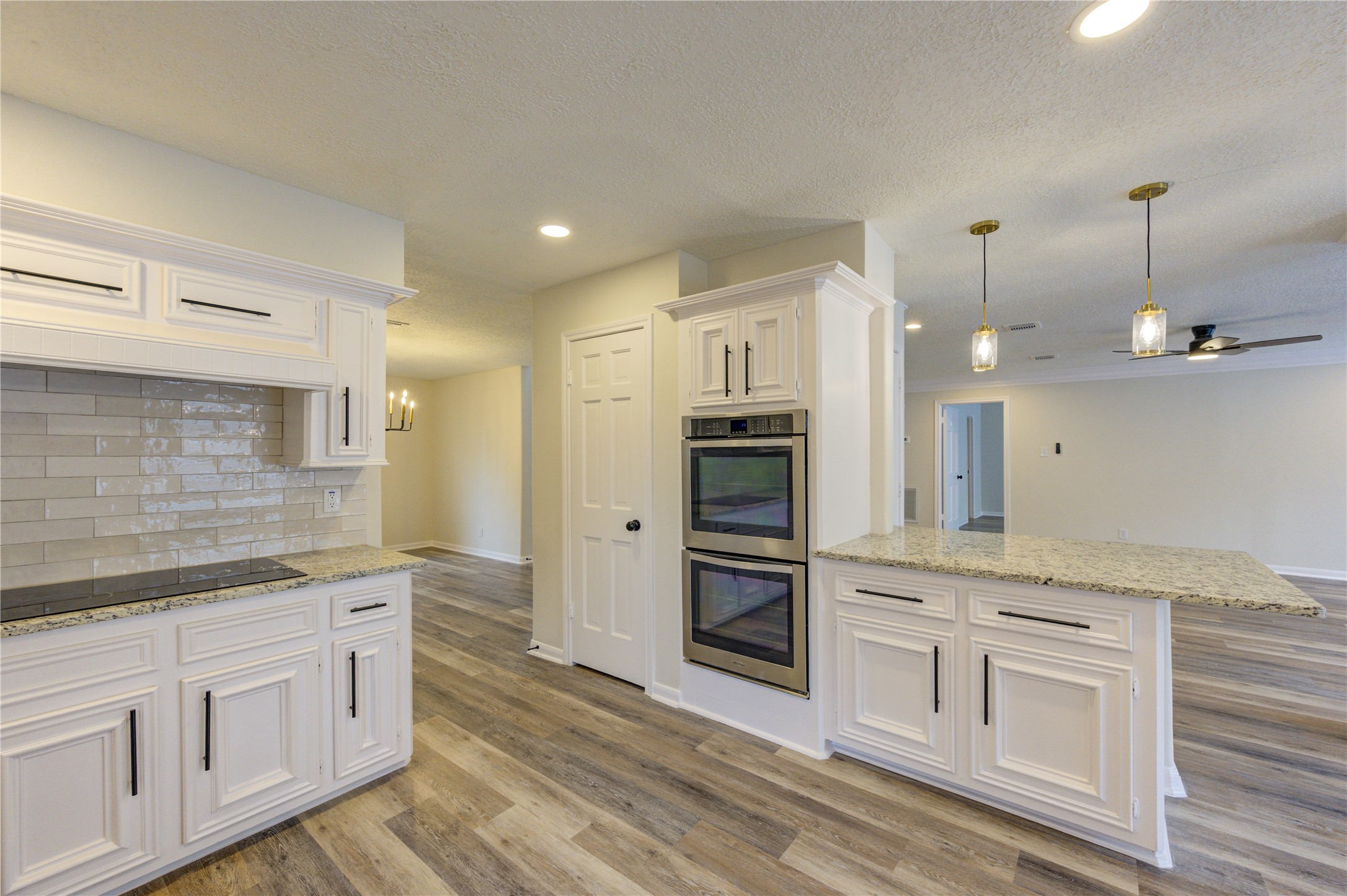 12015 Laneview Drive Houston, TX 77070 - Photo 14 of 40 a kitchen with white cabinets and sink
