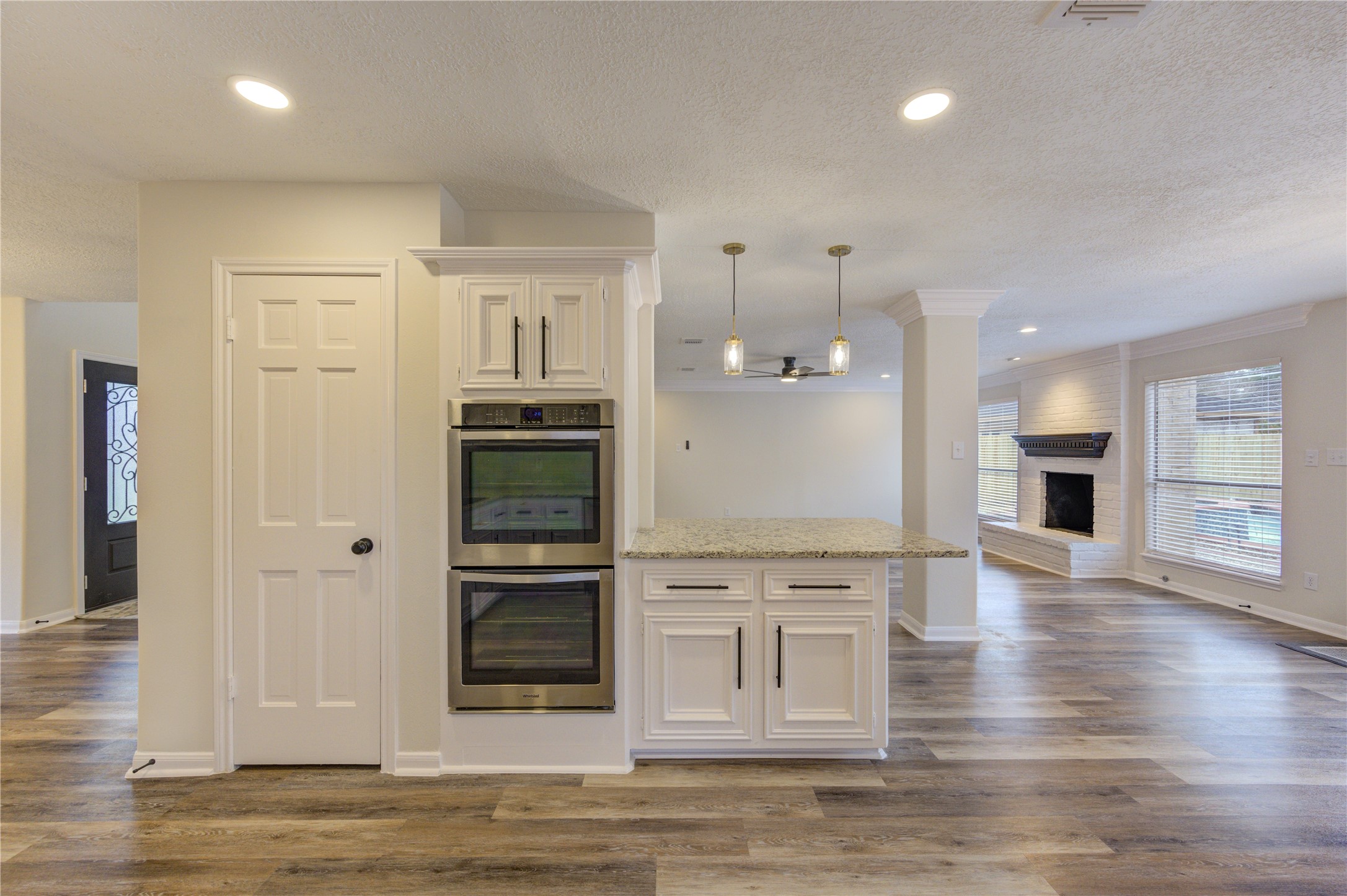 12015 Laneview Drive Houston, TX 77070 - Photo 15 of 40 a view of a kitchen with a sink and dishwasher a refrigerator with wooden floor