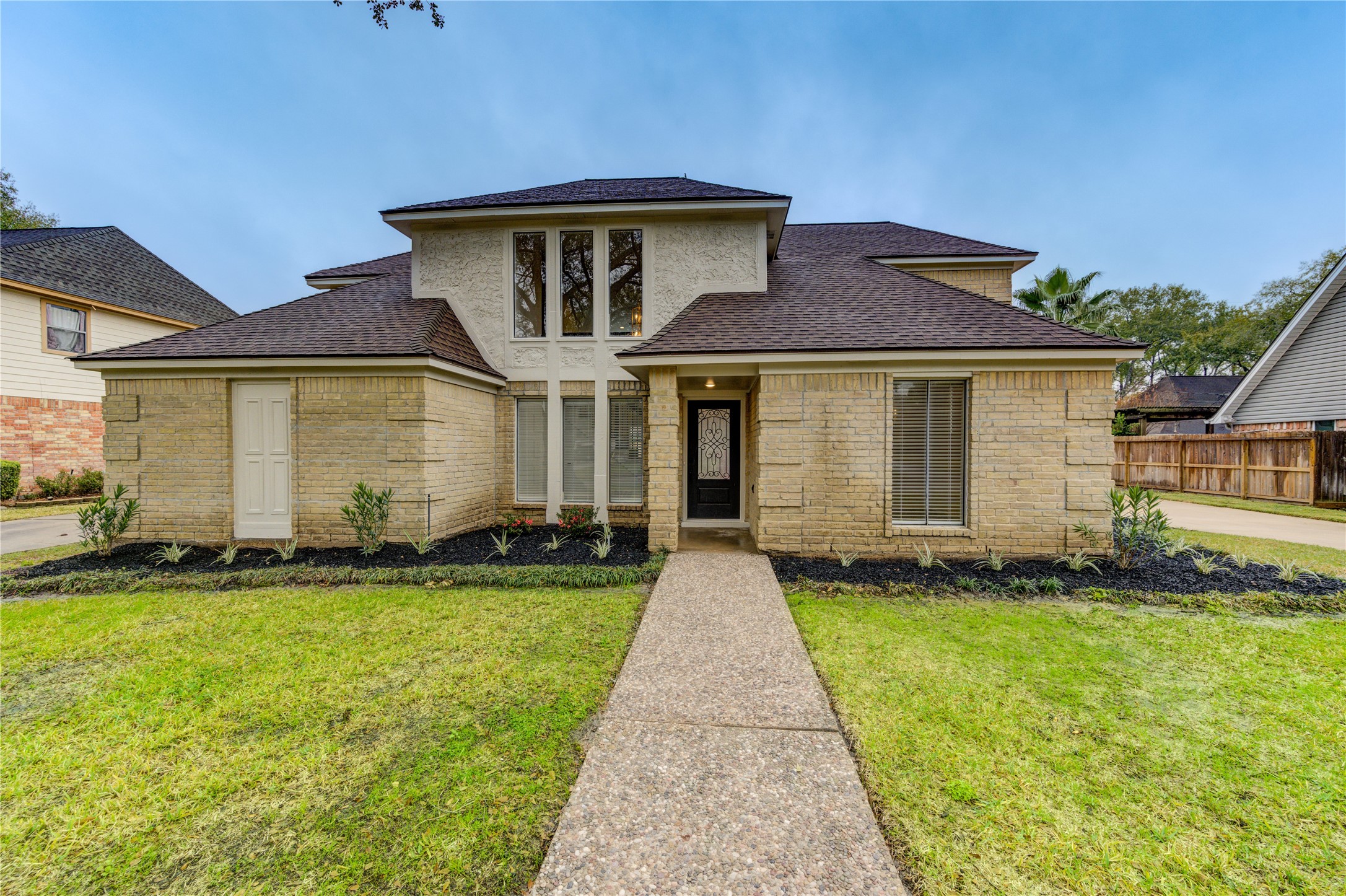 12015 Laneview Drive Houston, TX 77070 - Photo 2 of 40 a front view of a house with a yard