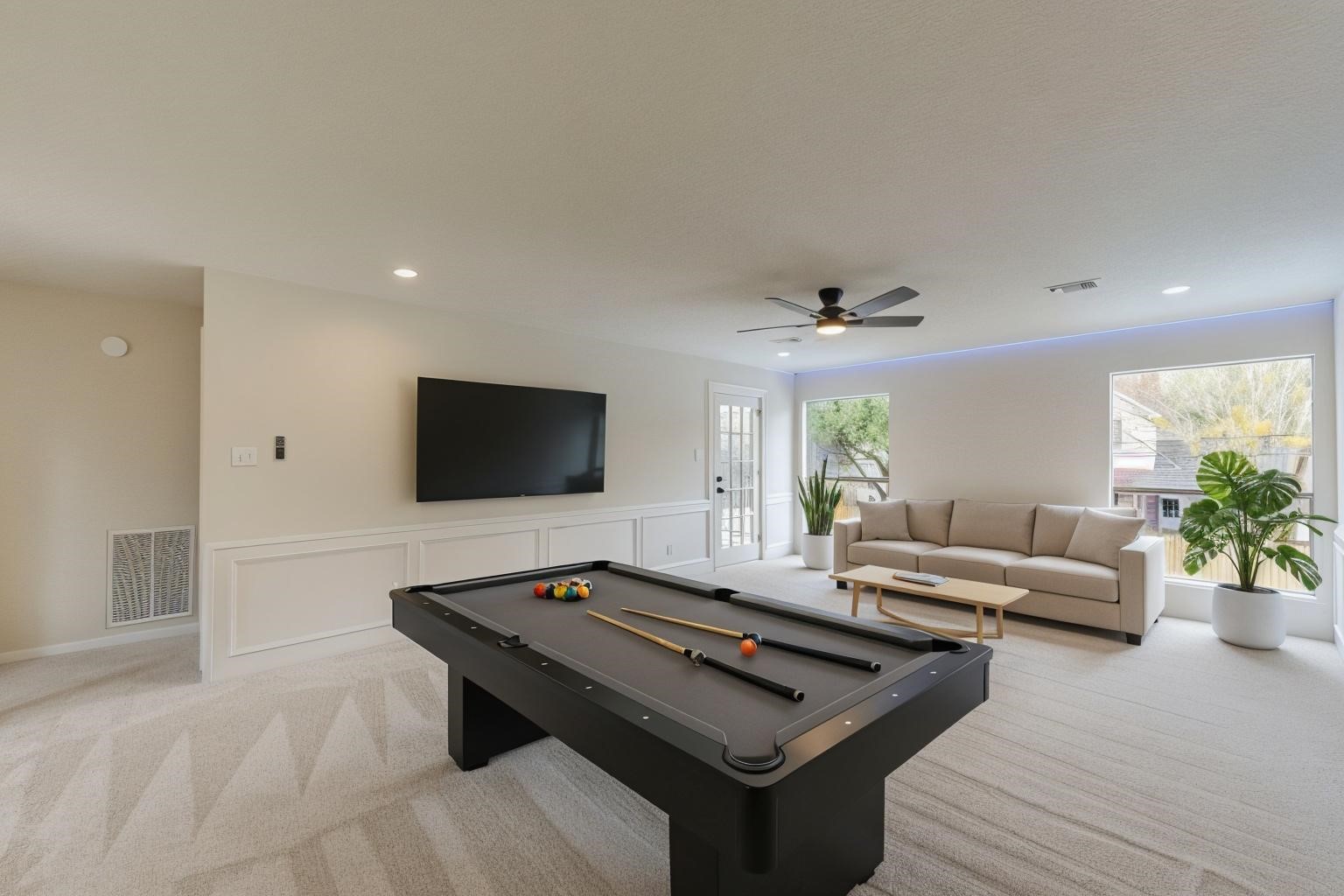 12015 Laneview Drive Houston, TX 77070 - Photo 23 of 40 a living room with furniture and a flat screen tv
