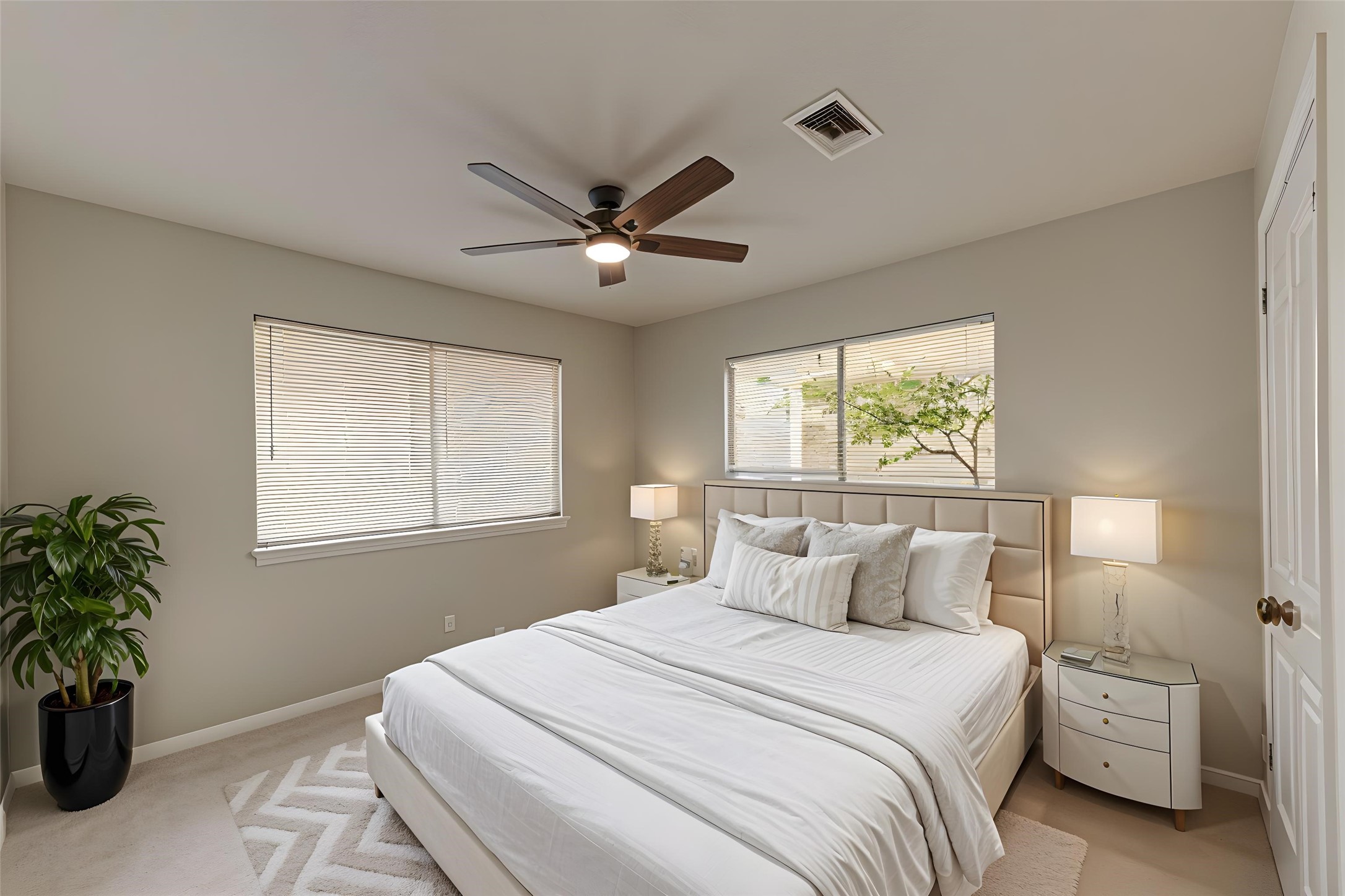 12015 Laneview Drive Houston, TX 77070 - Photo 30 of 40 a bedroom with a large bed and a chandelier