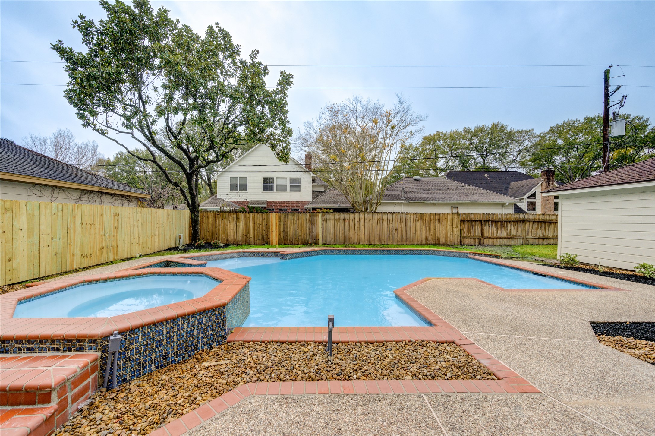 12015 Laneview Drive Houston, TX 77070 - Photo 33 of 40 a backyard of a house with trees