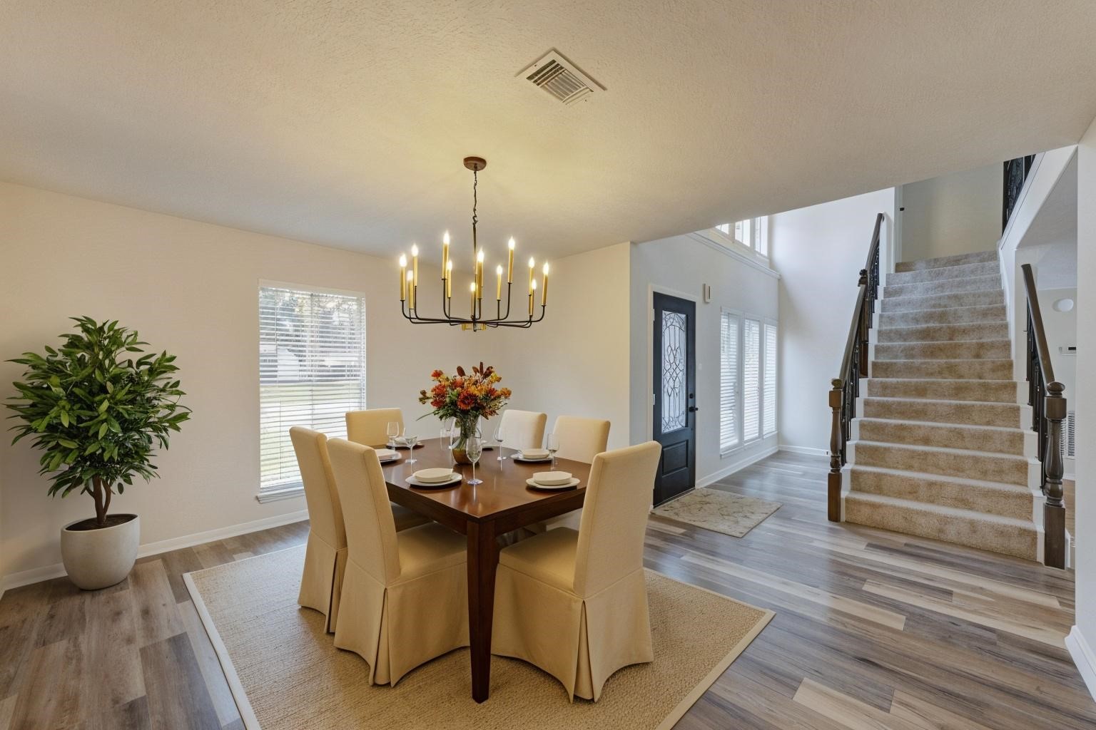 12015 Laneview Drive Houston, TX 77070 - Photo 38 of 40 a view of a dining room with furniture and wooden floor