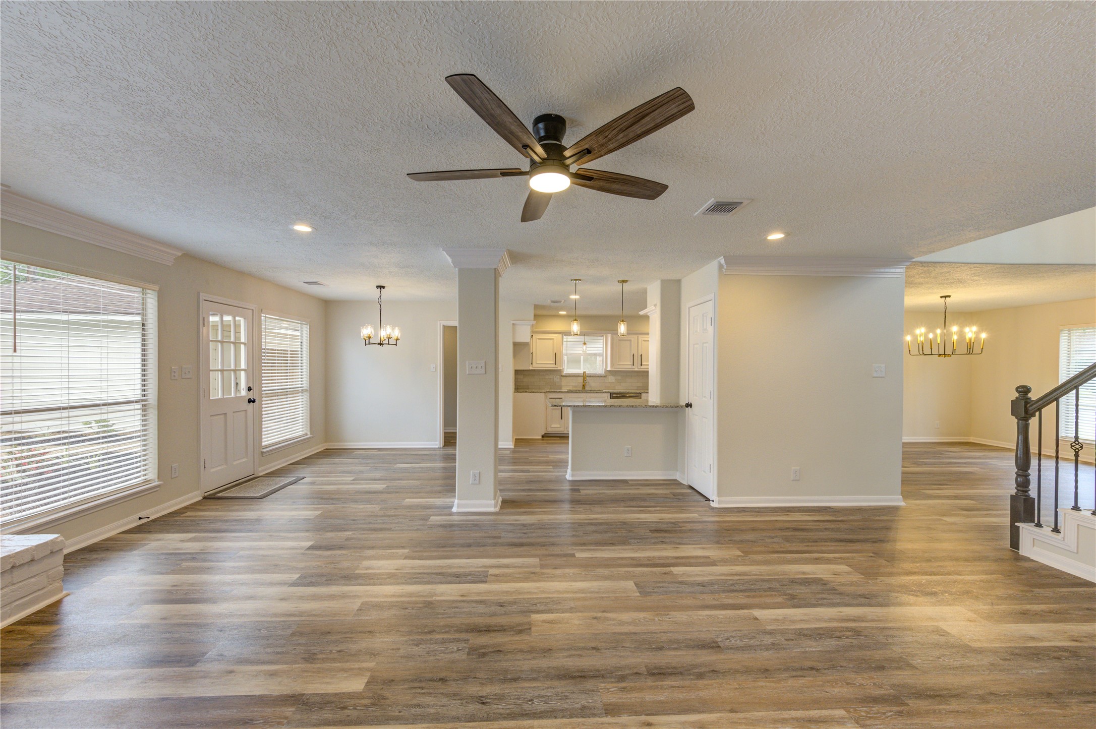 12015 Laneview Drive Houston, TX 77070 - Photo 9 of 40 a view of a livingroom with a ceiling fan and window