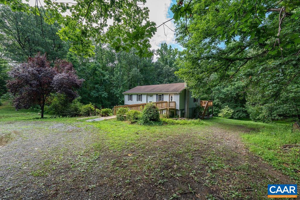 4965 Celt Road Stanardsville, VA 22973 - Photo 11 of 55 a view of a house with yard and a garden