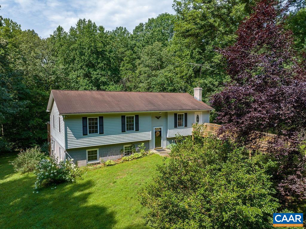 4965 Celt Road Stanardsville, VA 22973 - Photo 13 of 55 a front view of a house with a yard