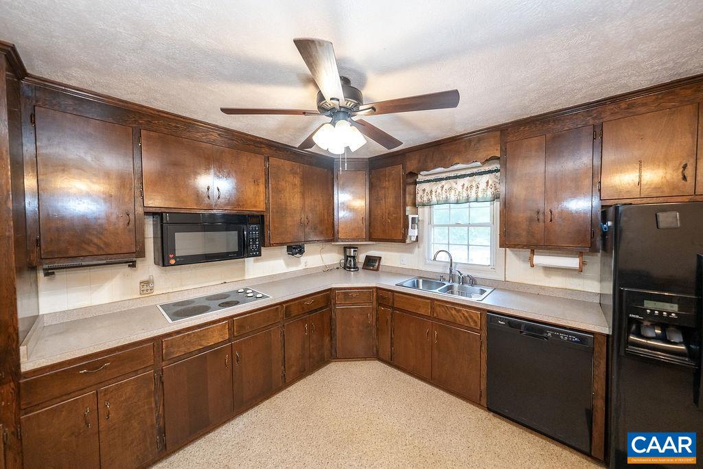 4965 Celt Road Stanardsville, VA 22973 - Photo 14 of 55 a kitchen with lots of counter space and a sink