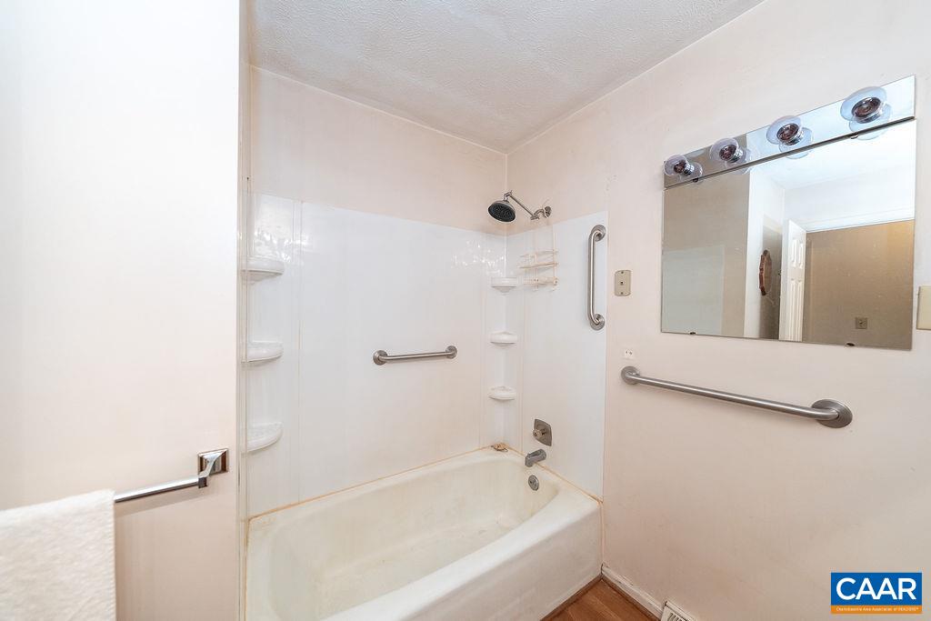 4965 Celt Road Stanardsville, VA 22973 - Photo 21 of 55 a bathroom with a bathtub and shower