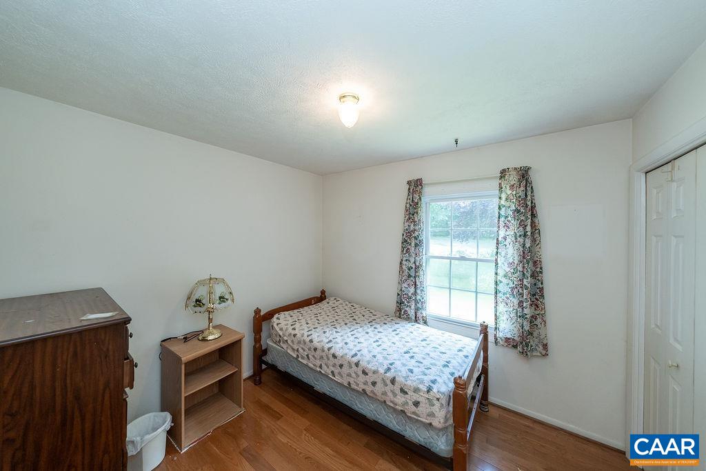 4965 Celt Road Stanardsville, VA 22973 - Photo 22 of 55 a bedroom with a bed and a window