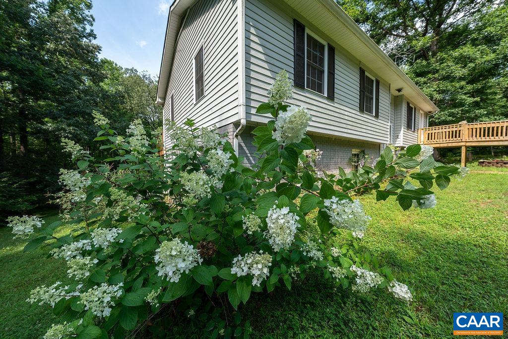 4965 Celt Road Stanardsville, VA 22973 - Photo 25 of 55 a view of a house with a yard