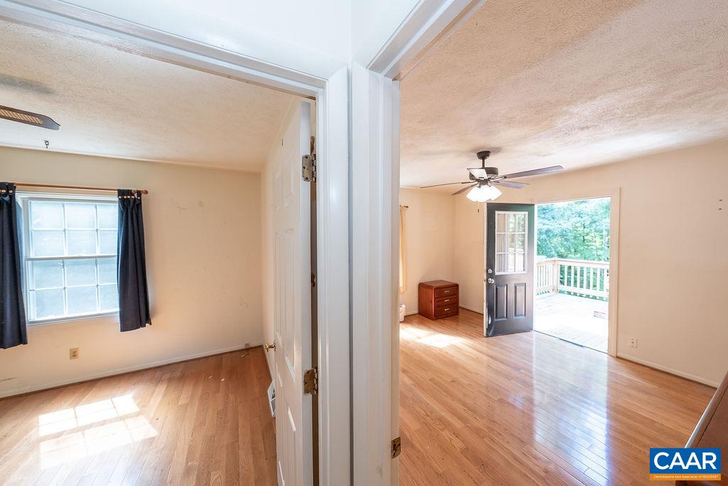 4965 Celt Road Stanardsville, VA 22973 - Photo 29 of 55 wooden floor in an empty room with a window