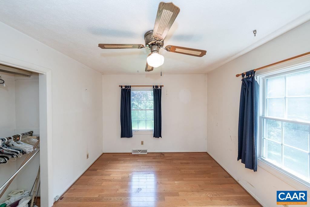 4965 Celt Road Stanardsville, VA 22973 - Photo 31 of 55 a view of a room with a ceiling fan and a window