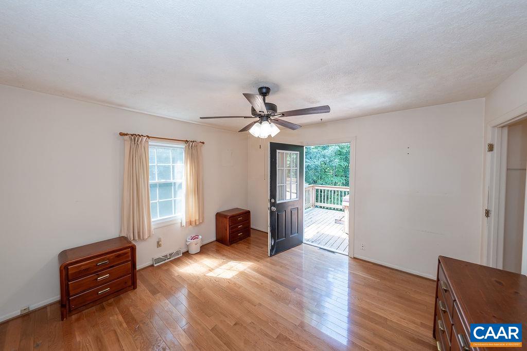 4965 Celt Road Stanardsville, VA 22973 - Photo 32 of 55 a view of livingroom with hardwood floor and window