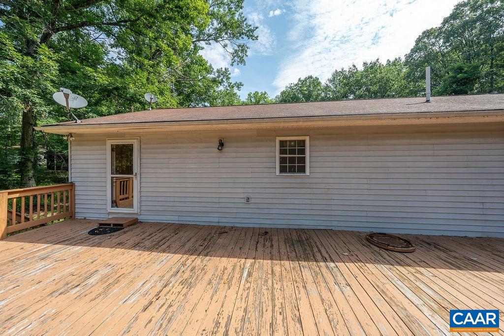 4965 Celt Road Stanardsville, VA 22973 - Photo 42 of 55 a view of backyard with a deck
