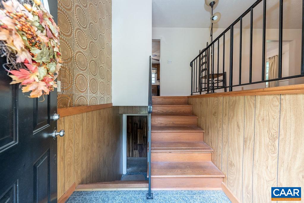 4965 Celt Road Stanardsville, VA 22973 - Photo 45 of 55 a view of staircase with wooden floor and a potted plant