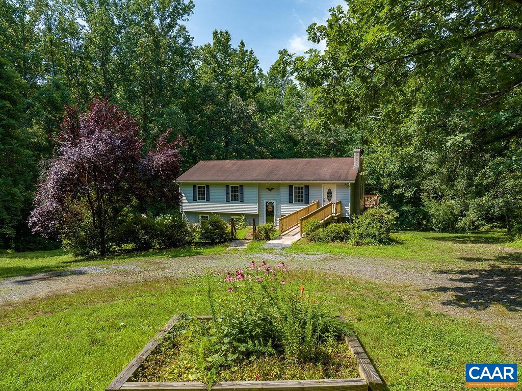 4965 Celt Road Stanardsville, VA 22973 - Photo 48 of 55 a view of a house with a yard