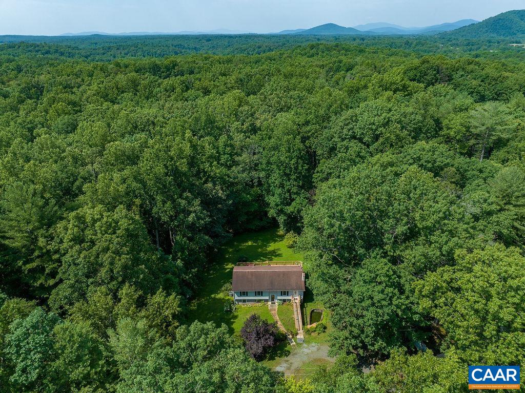 4965 Celt Road Stanardsville, VA 22973 - Photo 51 of 55 a view of a house with a yard and street