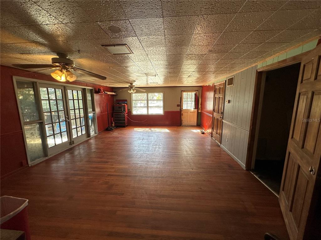 513 West Main Street Wauchula, FL 33873 - Photo 30 of 43 a view of a hallway with wooden floor