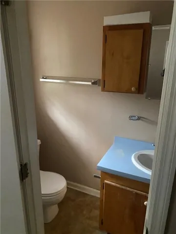a bathroom with a sink and a toilet