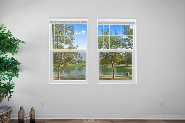 a spacious bathroom with a granite countertop tub sink shower and mirror