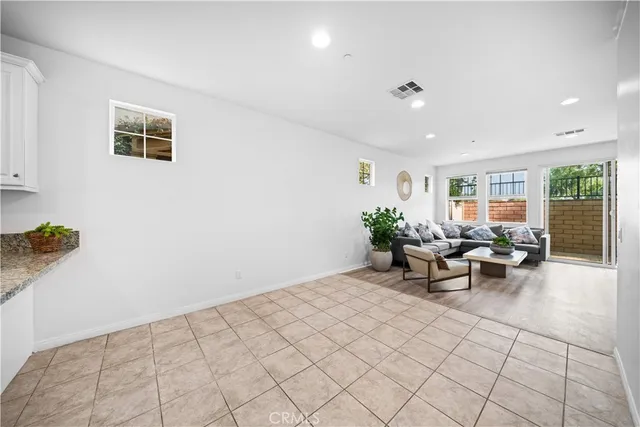 a view of a living room and dining room