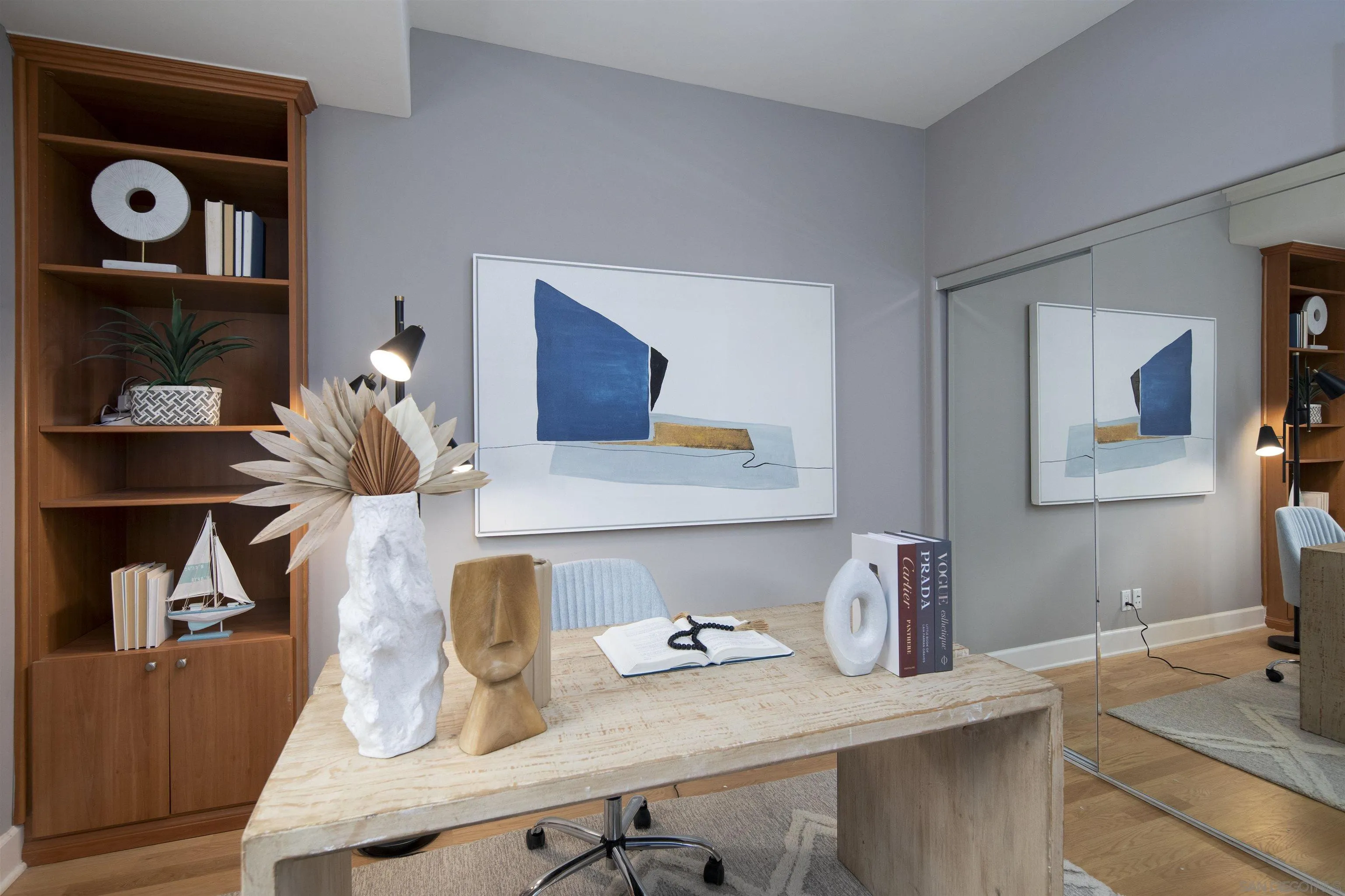 145 3rd Street Encinitas, CA 92024 - Photo 15 of 34 a bathroom with a sink and a mirror