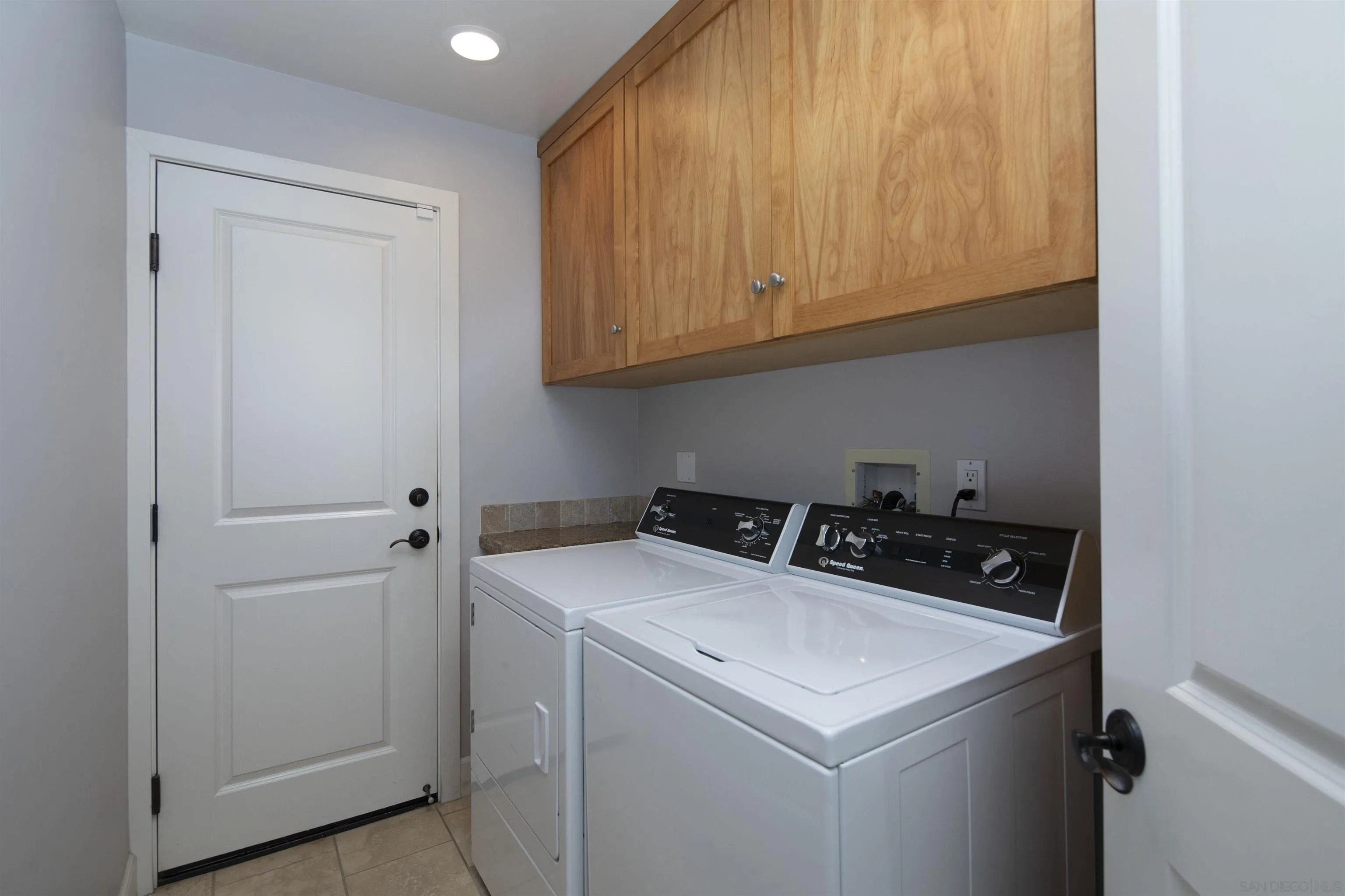 145 3rd Street Encinitas, CA 92024 - Photo 23 of 34 a utility room with dryer and washer