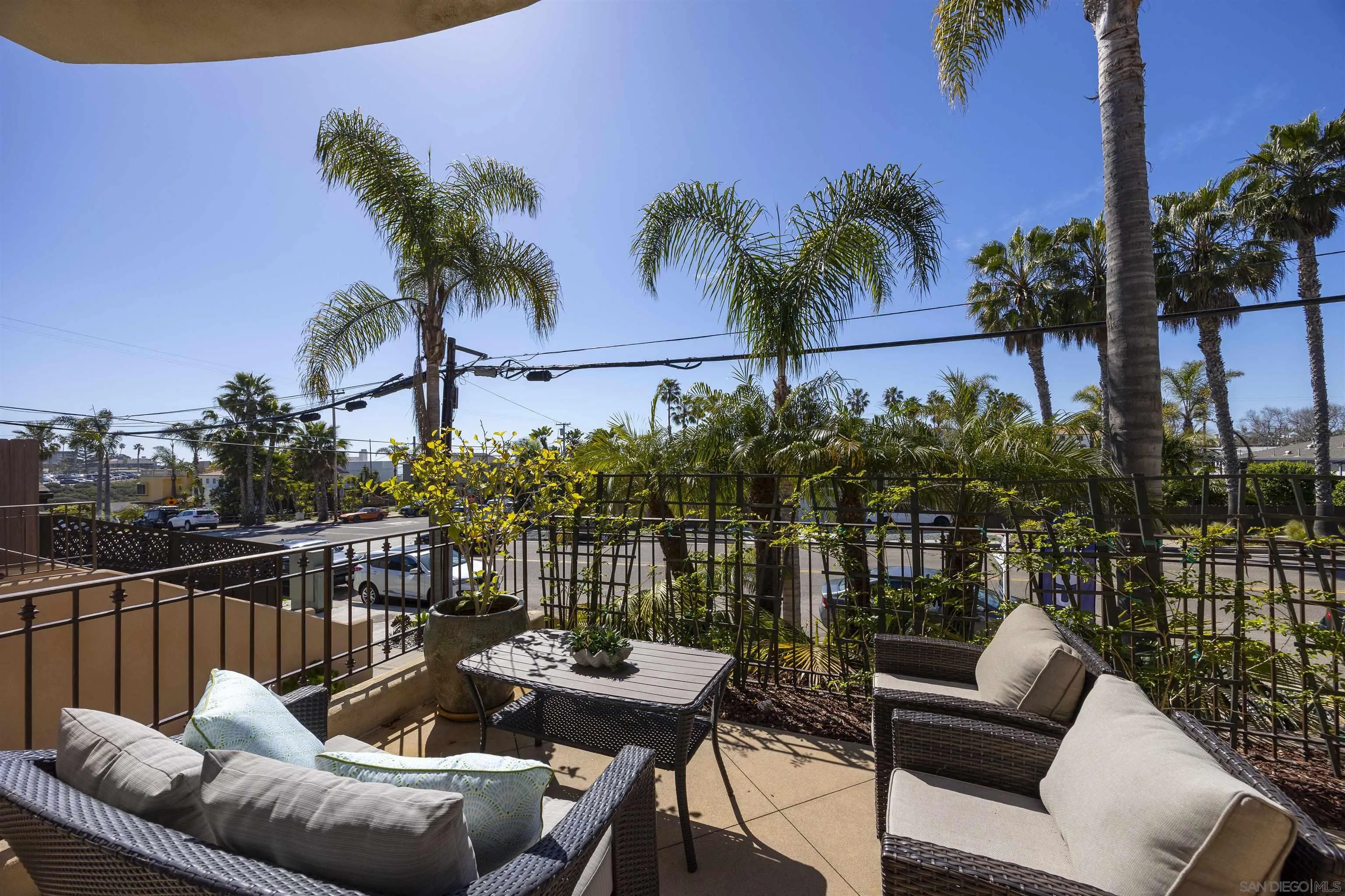 145 3rd Street Encinitas, CA 92024 - Photo 29 of 34 a view of a roof deck with couches and wooden floor