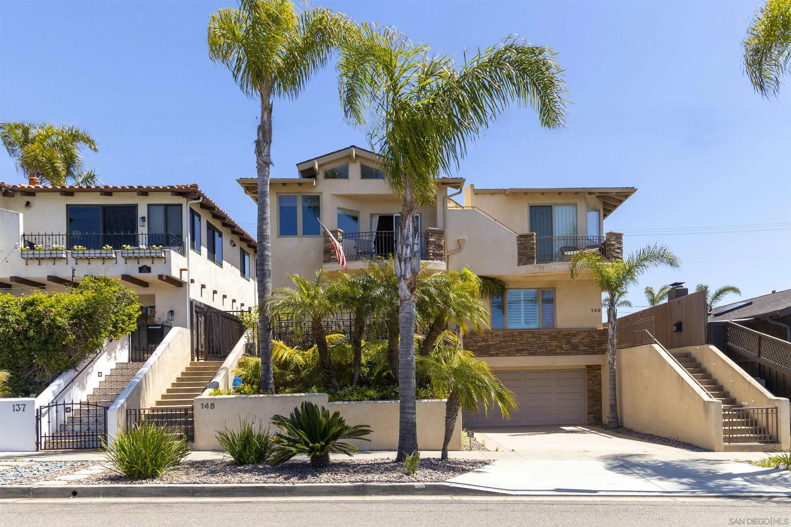 145 3rd Street Encinitas, CA 92024 - Photo 32 of 34 a front view of a house with garden
