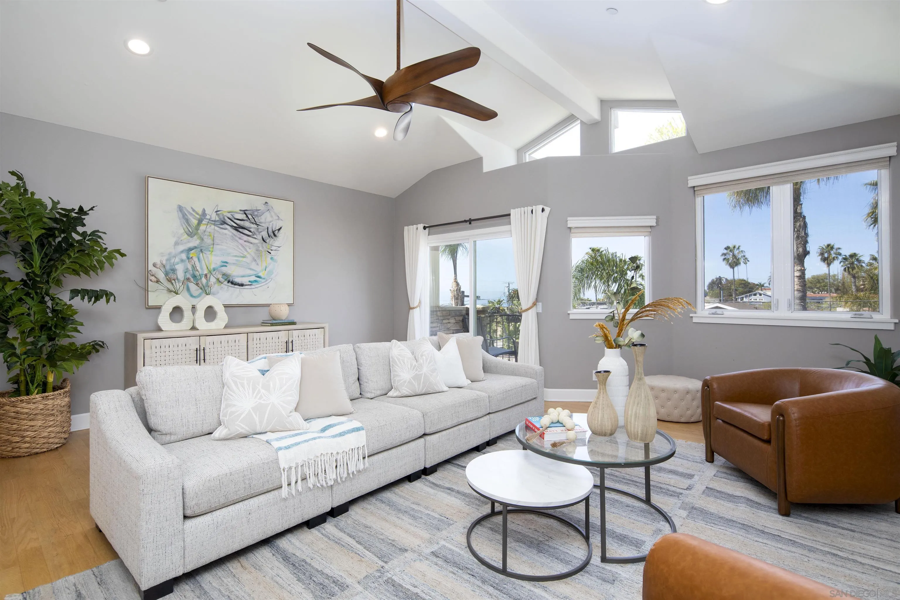 145 3rd Street Encinitas, CA 92024 - Photo 5 of 34 a living room with furniture and a large window