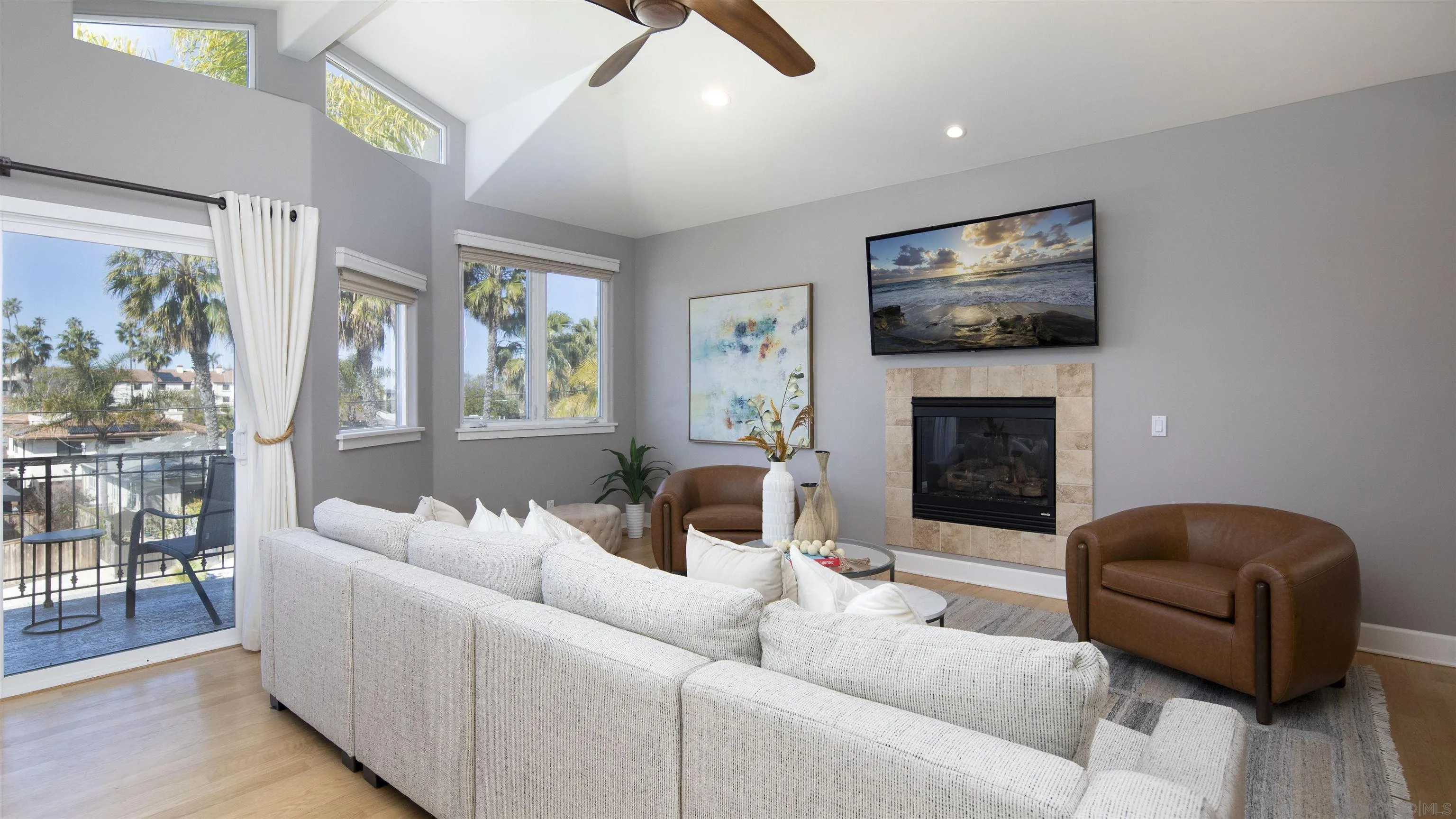 145 3rd Street Encinitas, CA 92024 - Photo 8 of 34 a living room with furniture and a fireplace