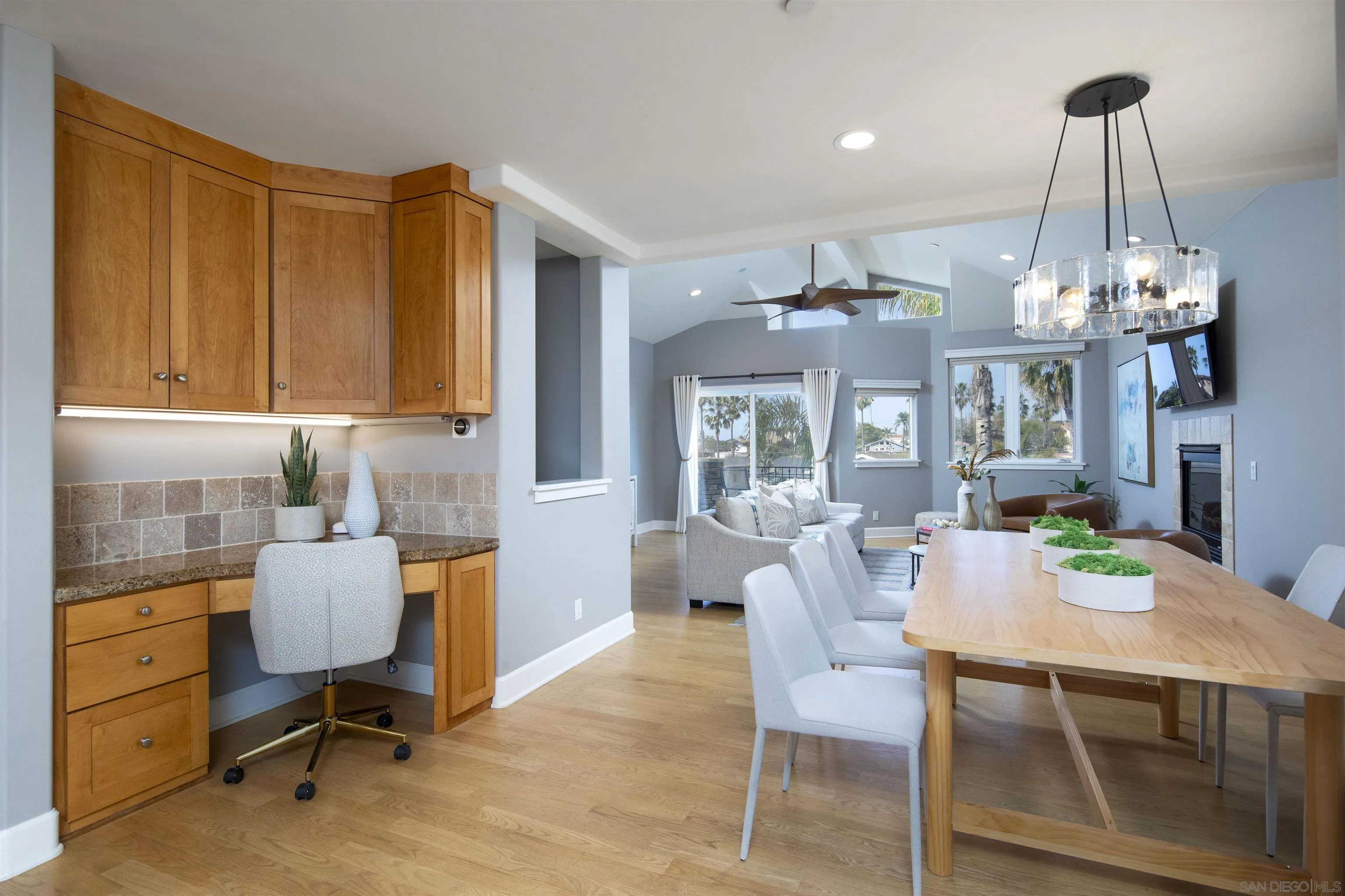 145 3rd Street Encinitas, CA 92024 - Photo 9 of 34 a view of a dining room with furniture and chandelier