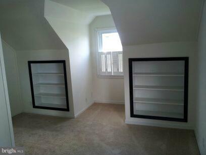3116 Sollers Point Road Baltimore, MD 21222 - Photo 4 of 8 an empty room with a empty space and windows