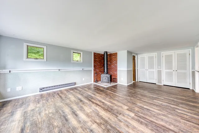 a view of an empty room and window