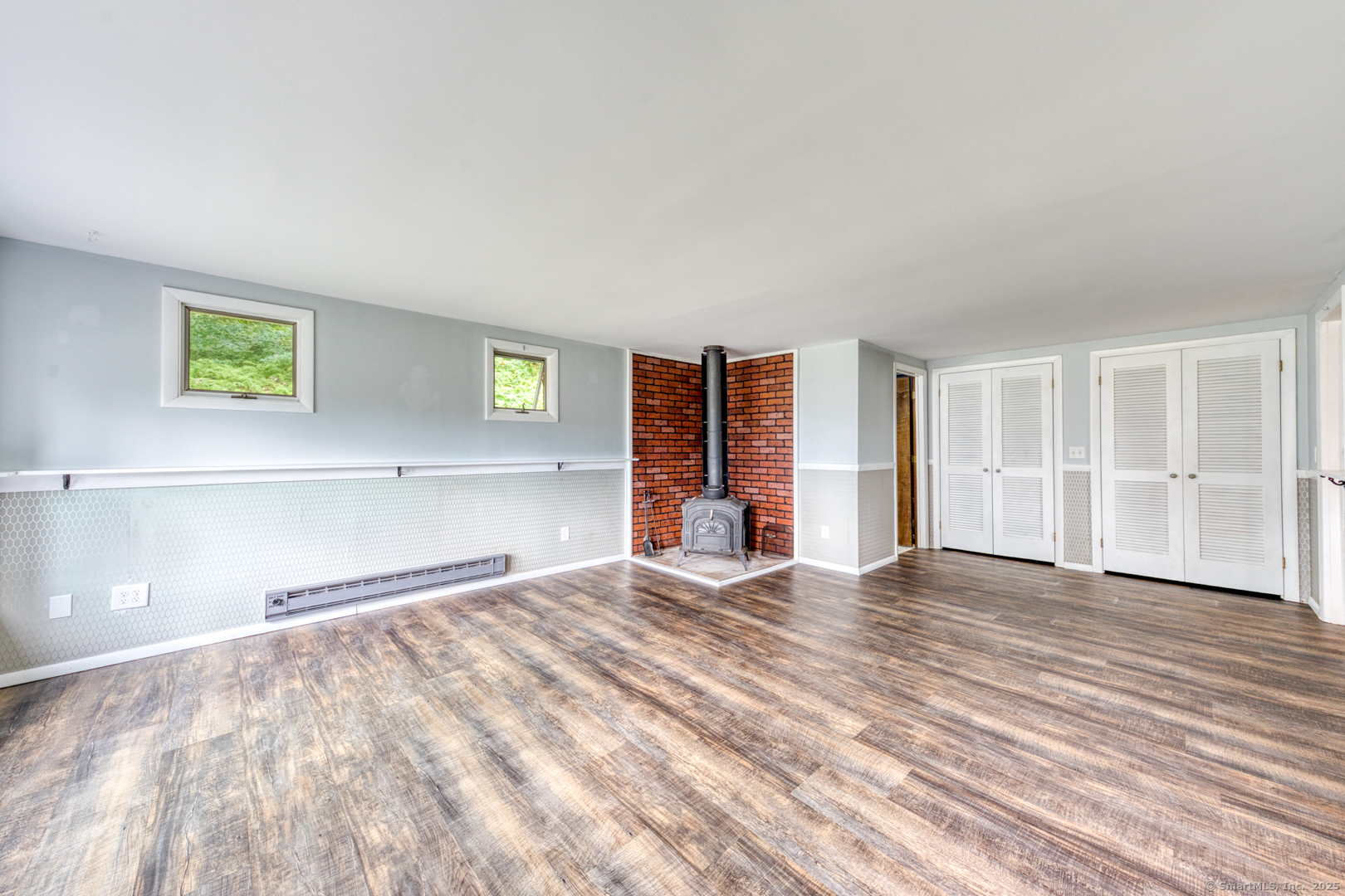 26 Edgarton Road Columbia, CT 06237 - Photo 20 of 35 a view of an empty room with window and wooden floor