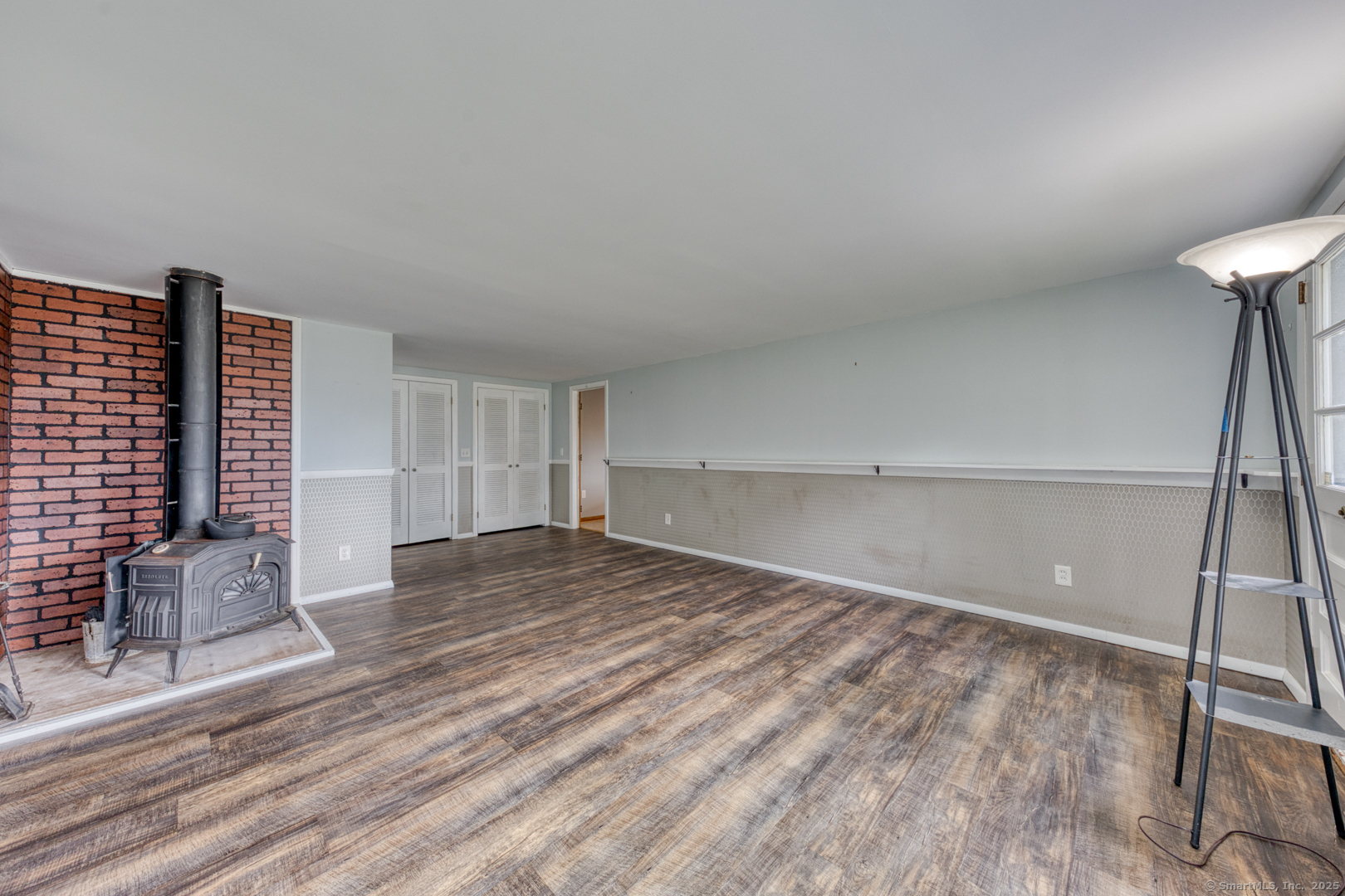 26 Edgarton Road Columbia, CT 06237 - Photo 22 of 35 a view of empty room with wooden floor and fan