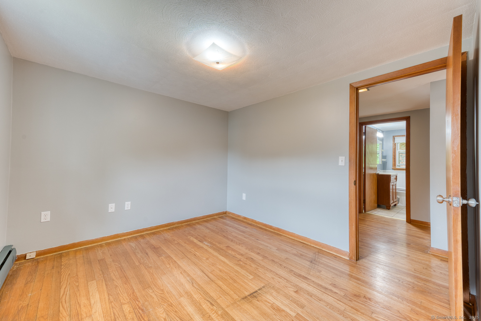 26 Edgarton Road Columbia, CT 06237 - Photo 26 of 35 a view of empty room with wooden floor