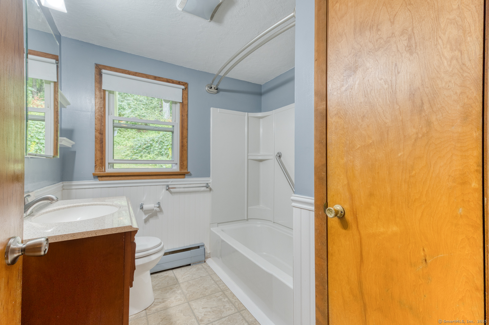 26 Edgarton Road Columbia, CT 06237 - Photo 31 of 35 a bathroom with a tub sink and mirror