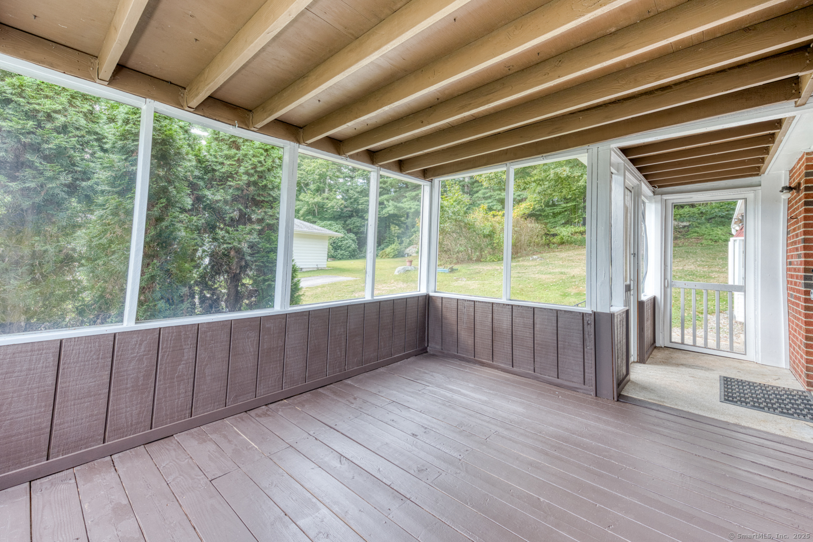 26 Edgarton Road Columbia, CT 06237 - Photo 33 of 35 a view of outdoor space with wooden floor and outdoor seating