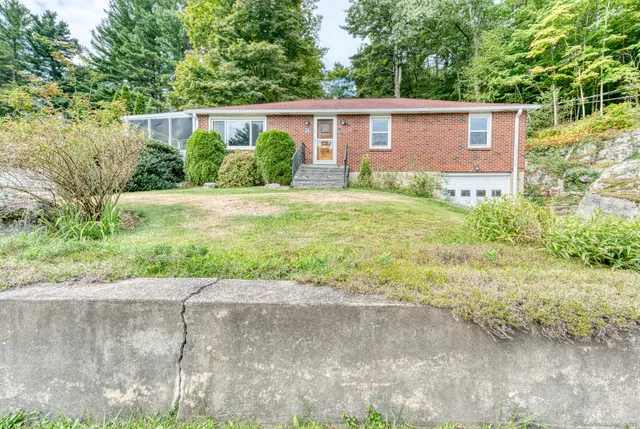 a view of backyard with green space