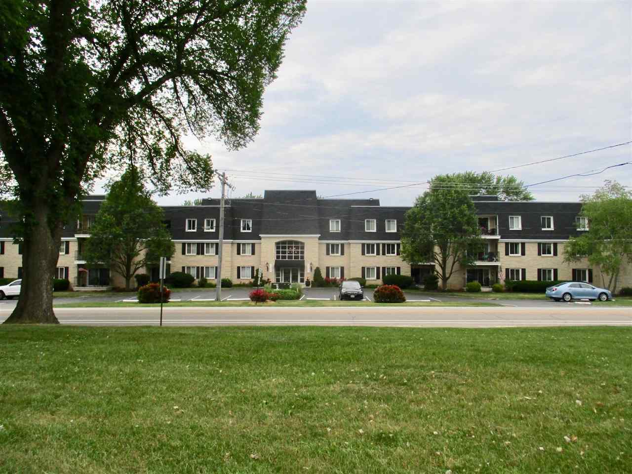 a building with trees in front of it