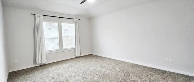 a kitchen with a sink and a refrigerator