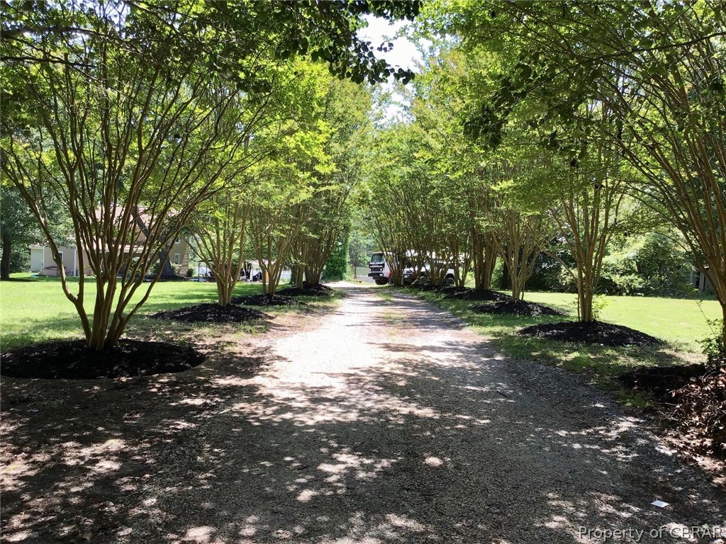 3948 Paradise Point Road Hayes, VA 23072 - Photo 5 of 15 Enter the Crepe Myrtle tree lined driveway to this bucolic setting.