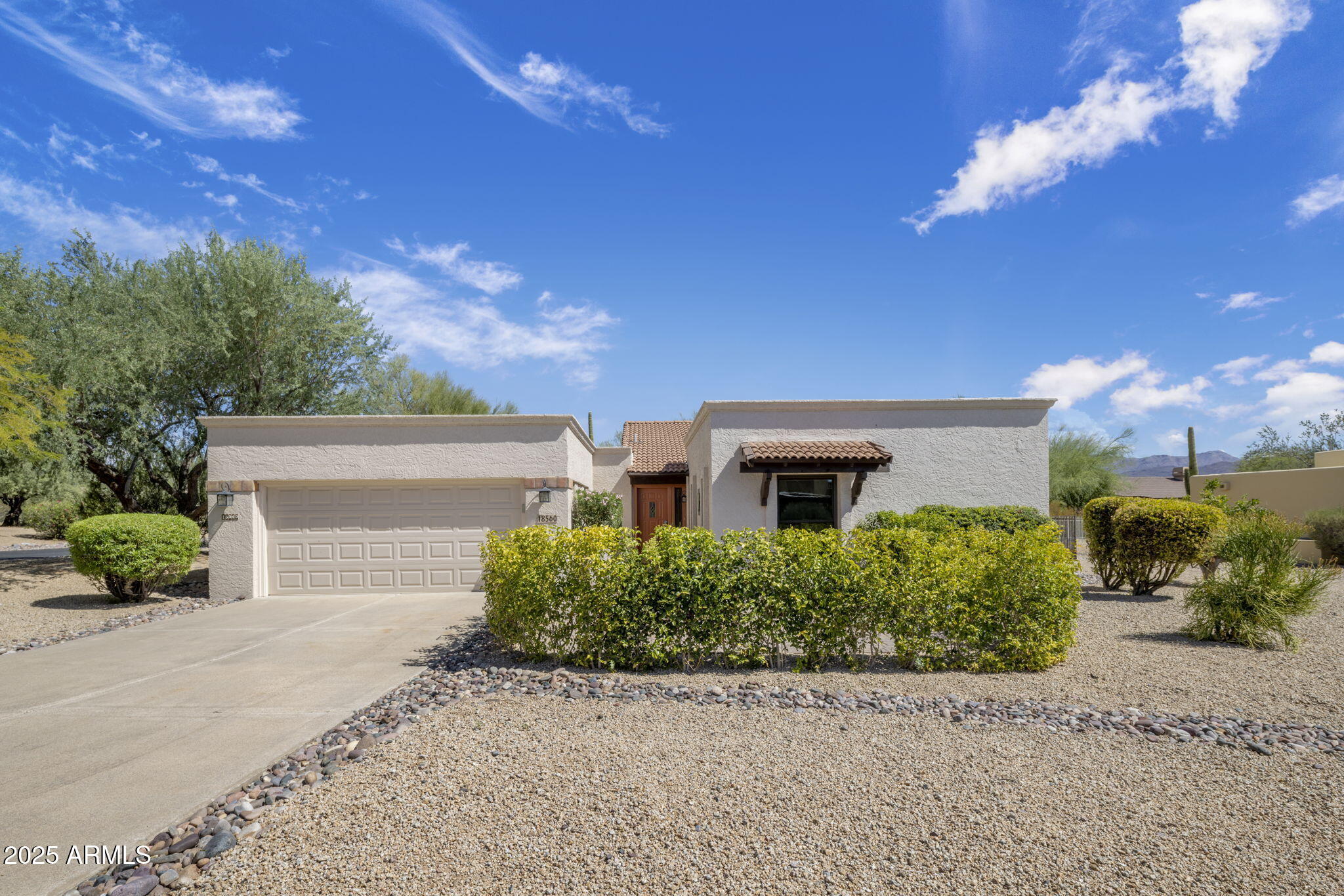 18560 East Horseshoe Bend Rio Verde, AZ 85263 - Photo 2 of 42 front view of a house with a yard